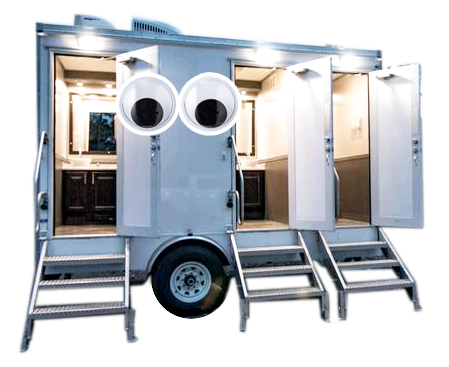 a restroom trailer with googly eyes